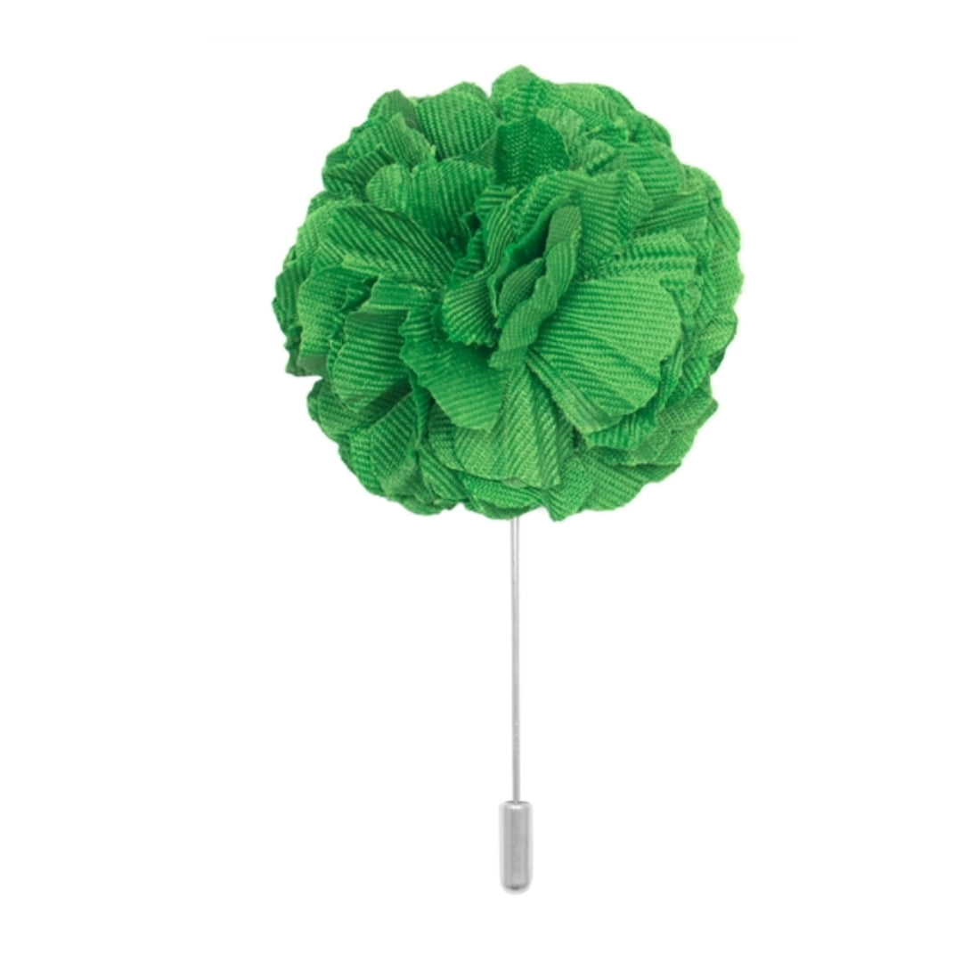green cotton flower lapel pin on white background men’s boutonniere

