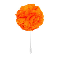 orange cotton flower lapel pin on white background men’s boutonniere
