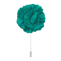 teal cotton flower lapel pin on white background men’s boutonniere