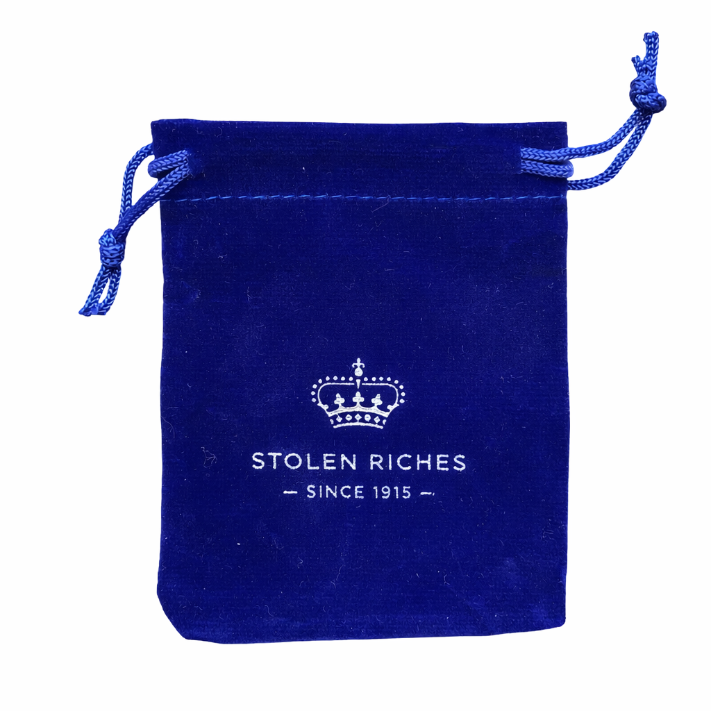 luxury blue velvet jewelry pouch with Stolen Riches logo