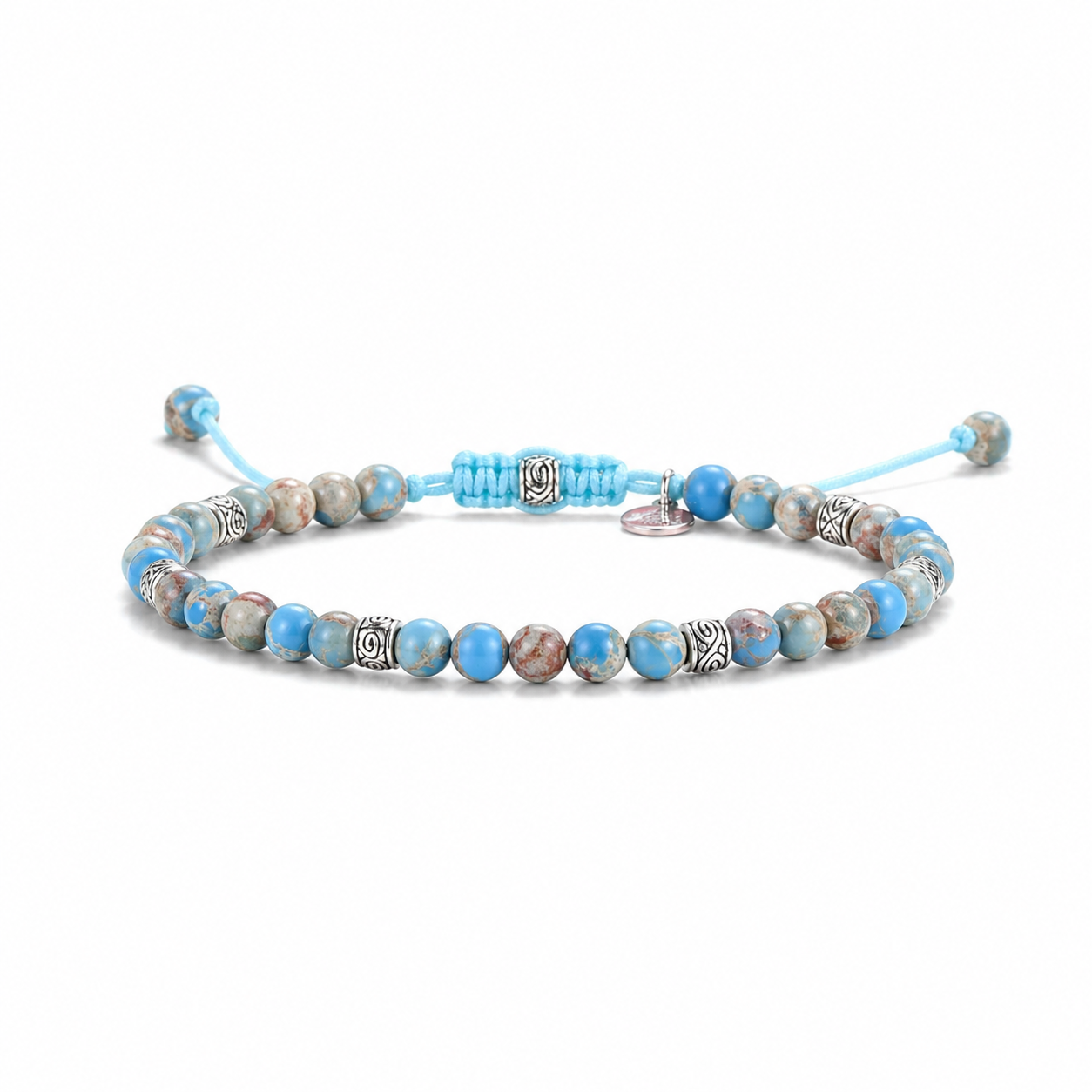 Beaded bracelet with blue and brown beads on a white background